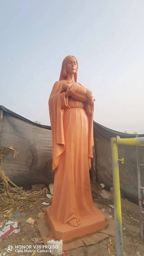 Fiberglass Mary holding a baby statue for outdoors usage